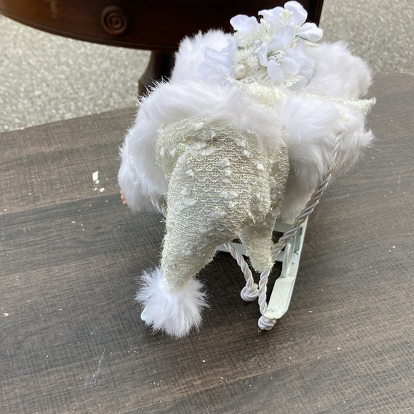 Snowy Porcelain Baby on a Sleigh - Picture 5 of 6